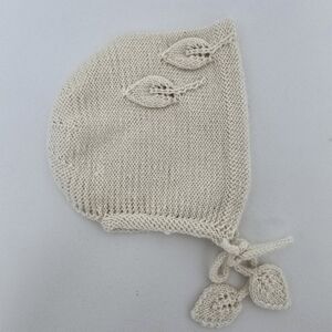 Hand-Knit Cream Baby Bonnet with Leaf Accents